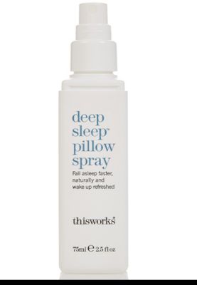 Spray bottle of This Works Deep Sleep pillow spray