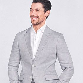 Man wearing pale grey linen suit