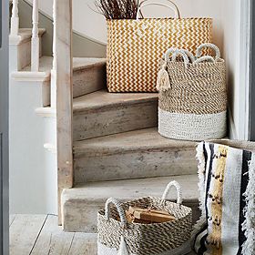 Woven storage baskets on stairs