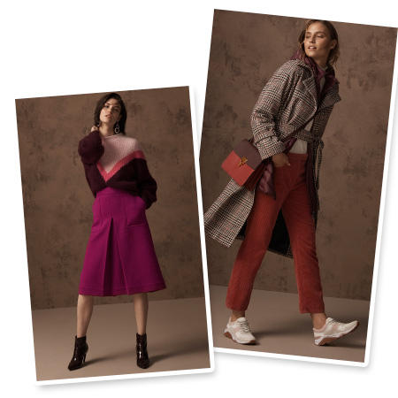 Model wears a pink and burgundy V-print sweater with a fuchsia midi skirt and black ankle boots & Model wears a grey checked coat, burnt-orange trousers, white trainers and a red cross-body bag