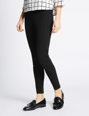 white trousers with gold buttons