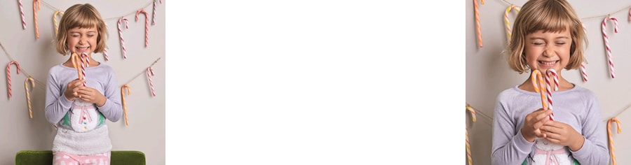 Girl wearing snowman pyjamas