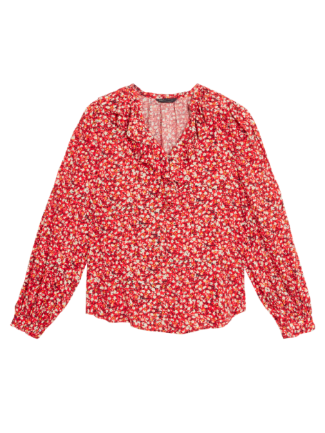 Orange printed blouse. Shop now