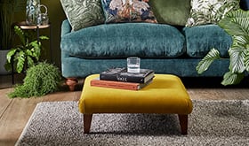 Velvet sofa and footstool