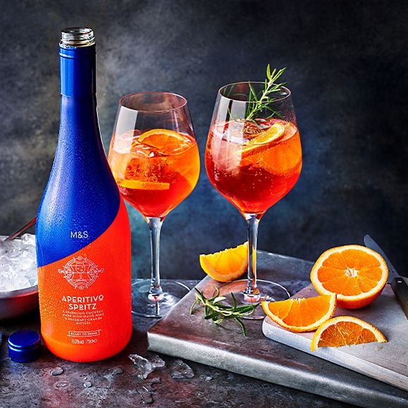 A bottle and glasses of aperitivo spritz