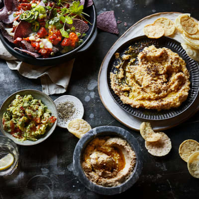 A selection of homemade dips and crisps