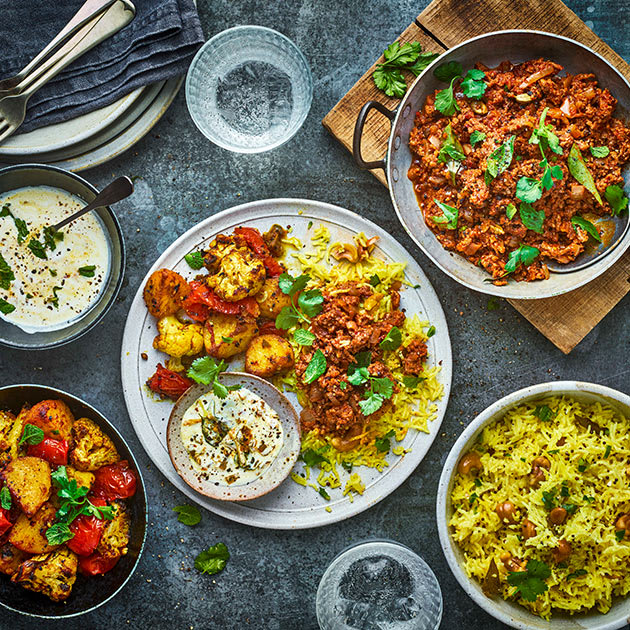 Lamb masala keema, aloo gobi, lemon rice and kachimoru