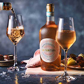 M&S bottle of rose wine being poured into two glasses