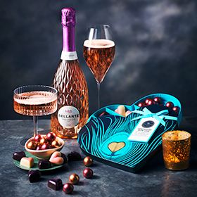 M&S Collection heart-shaped chocolate box and bottle of Prosecco