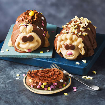 M&S Colin the Caterpillar meets Easter lamb cakes on board