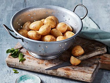 Jersey Royal potatoes in a strainer