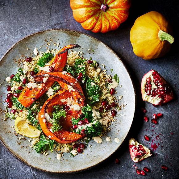 Roasted pumpkin salad with tahini dressing and pomegranate