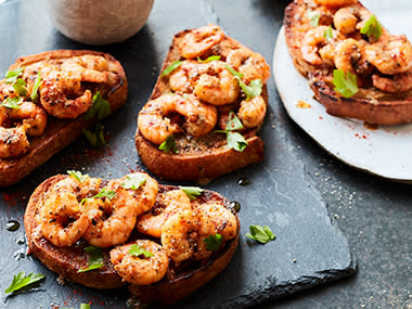 Garlic and herb prawns on toast