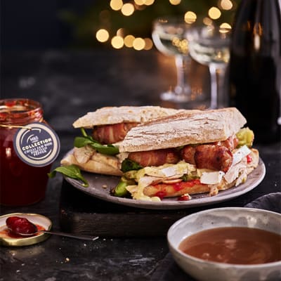 Leftover turkey sandwich with gravy for dipping