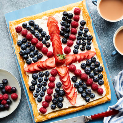 Summer tart with blueberries, strawberries and raspberries