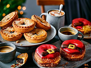 Stack of mince pies and Santa’s Yumnuts served with coffee