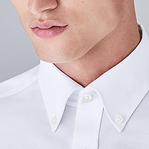 Man wearing button-down collar shirt