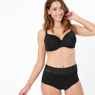 Woman wearing black Confidence shorts with lace trim and bra