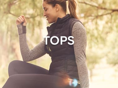 Woman wearing a Goodmove padded gilet, long sleeved top and leggings