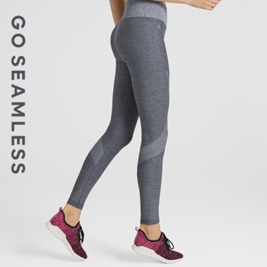 Woman wearing grey leggings