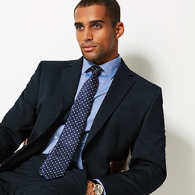 Man wearing navy suit