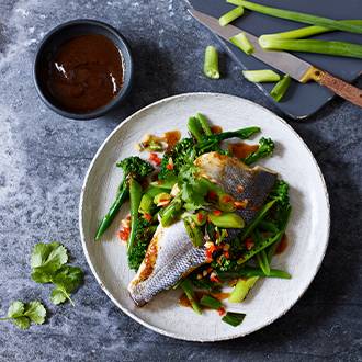 Soy, ginger and garlic steamed sea bass