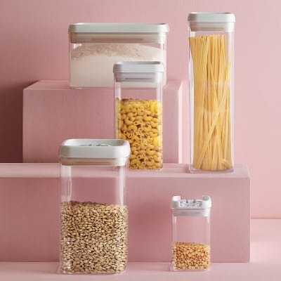 Square and rectangular clear storage containers with white plastic lids