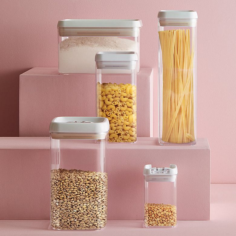 Square and rectangular clear storage containers with white plastic lids