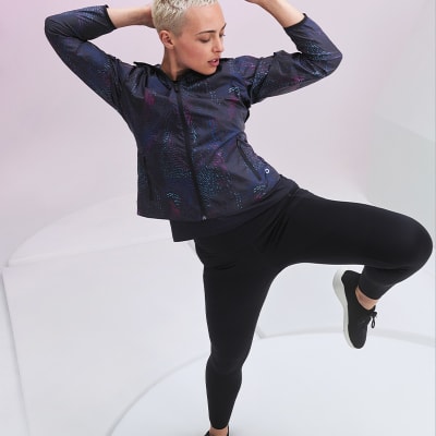 Woman wearing black Goodmove jacket and joggers