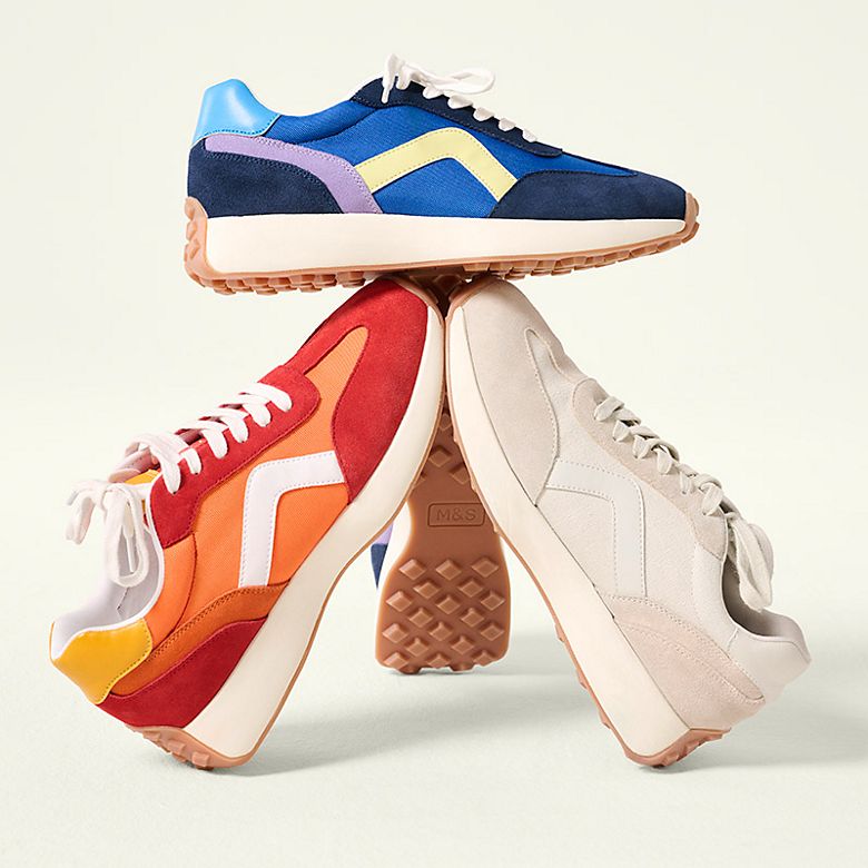 Group of trainers in orange, red, blue and beige. Shop the trainers. 
