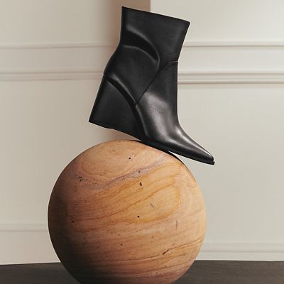 Black wedge-heel ankle boots. Shop women’s boots