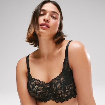 Woman wearing black lace bra. Shop fuller-bust bras