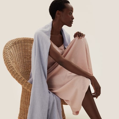 https://asset1.cxnmarksandspencer.com/is/image/mands/20210624_EP_WW_Blanket-wrap-DE_HERO?$Style_living_700x700_IPAD$