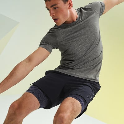Man wearing Goodmove shorts and T-shirt
