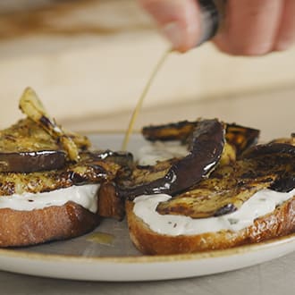 Aubergine and tzatziki crostini