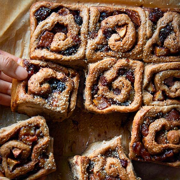 Vegan cinnamon, apple and raisin rolls