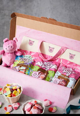 Percy Pig letterbox gift with sweets and soft toy. Shop now