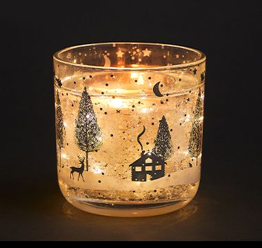 Winter light-up LED Christmas candle. Shop now