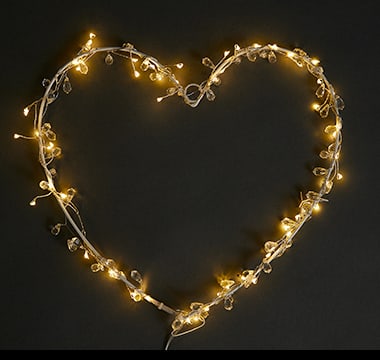 Heart-shaped room decoration with lights. Shop now