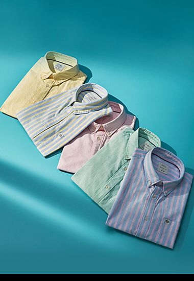 Selection of men’s shirts in assorted colours. Shop men’s shirts.