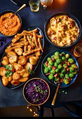 A selection of Christmas sides including brussels sprouts and cauliflower cheese. Order now
