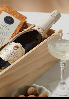Pop the prosecco wooden gift box with prosecco and chocolate treats. Shop now
