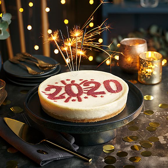 New York 2020 cheesecake, pictured with sparklers 