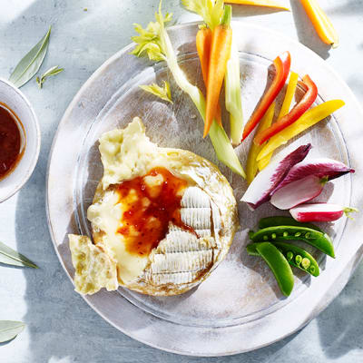 Barbecued camembert with a sweet chilli glaze and crunchy crudités