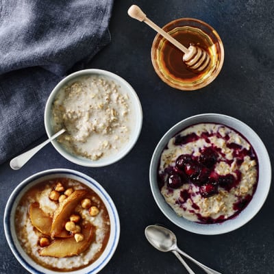 Bowls of porridge with different toppings