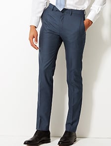Man wearing blue skinny-fit trousers