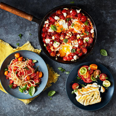 Raw tomato pasta, easy baked eggs and a simple tomato salad with pan-fried cod