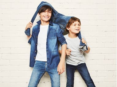 Boy wears jeans and denim shirt