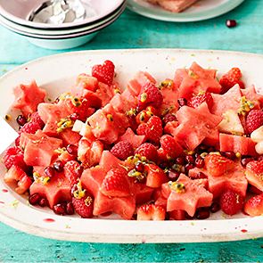 Pink fruit salad made with watermelon stars and berries