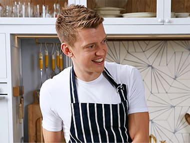 Chris Baber cooking in his kitchen